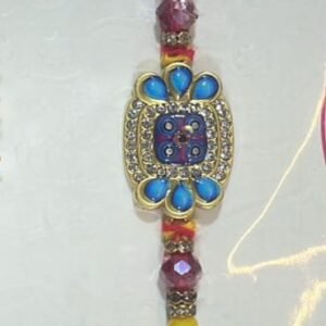 Colorful jeweled blue centerpiece  with a beautiful beaded rakhi bracelet