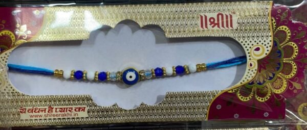 Evil eye beautiful white ,blue ,gold coloured beads Rakhi